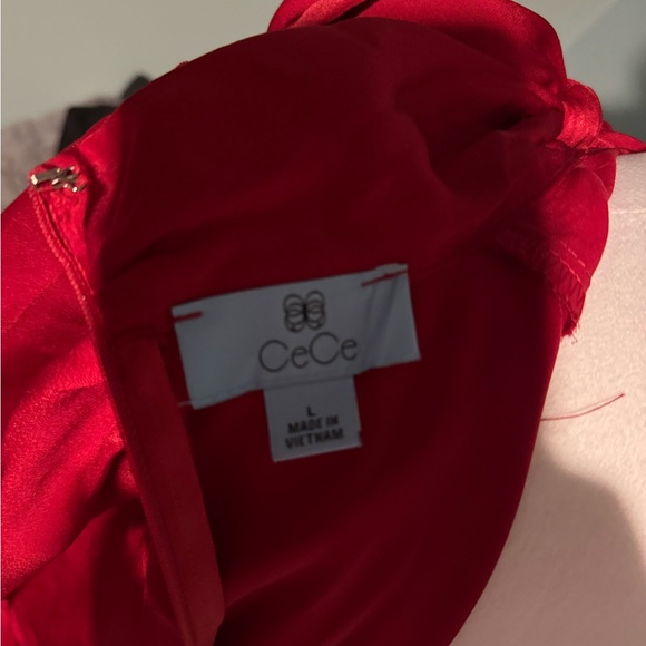 CeCe Charm Tie Neck Peplum with flouncy sleeve. Size large
Luminous Red - Picture 5 of 6